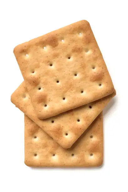 Traditional dry biscuits, water crackers, hardtacks, group isolated on white background