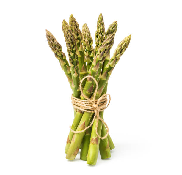 fresh green asparagus on a white background