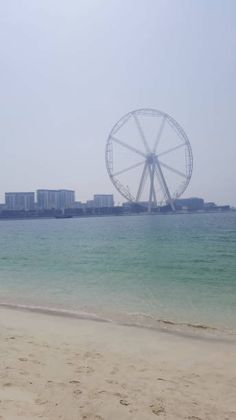 istock Jumeirah beach and Dubai city skyline, UAE 1386684970