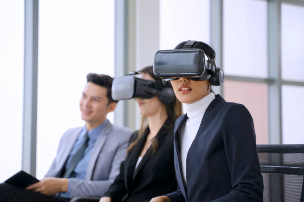 istock Employee  are working together with VR glasses. 1386692395