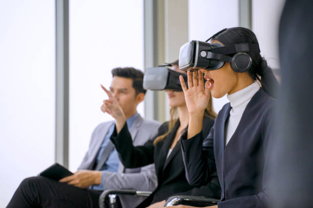 istock Employee  are working together with VR glasses. 1386692397