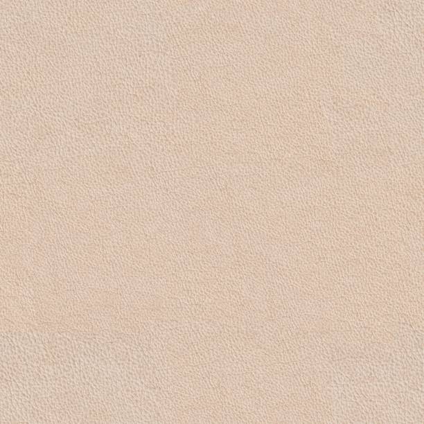 istock Bright luxury beige leather background. Seamless square texture, tile ready. 1386694796