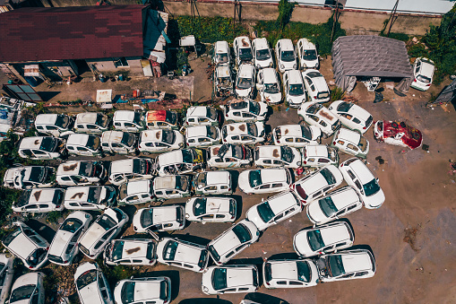 Aerial view image of scrap cars. Aerial view of old cars. Cars for spare parts.