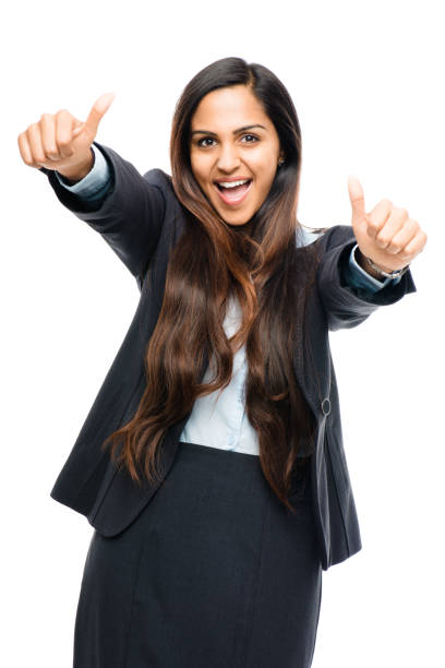 снимок молодой бизнесвумен, подняющей большие пальцы вверх на фоне студии - businesswoman advertise placard advertisement стоковые фото и изображения