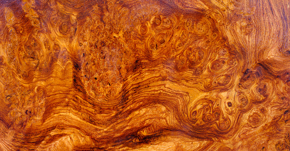Natural Afzelia burl wood striped is a wooden beautiful pattern for background
