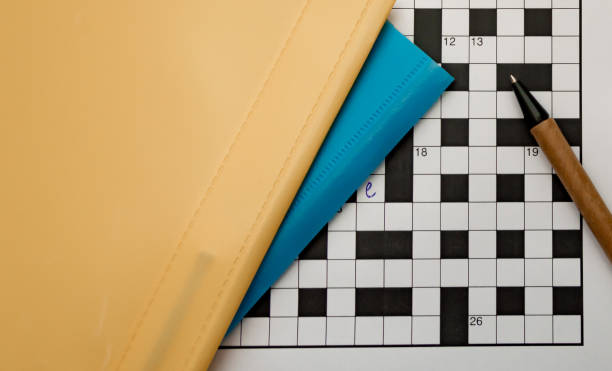 istock crossword puzzles, background top view free space yellow blue color top isolate 1386705165
