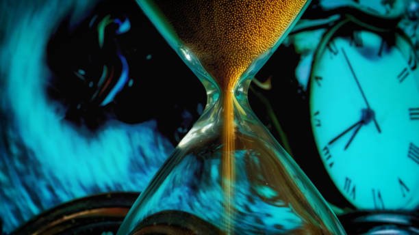 istock hourglass and concept of spacetime 1386706228