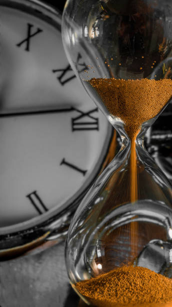 istock hourglass and concept of spacetime 1386706233