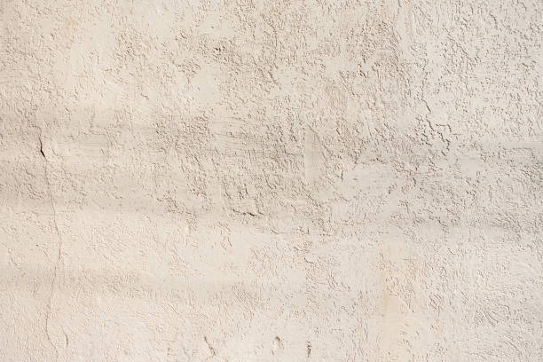 istock Abstract white grunge cement wall texture background 1386707379