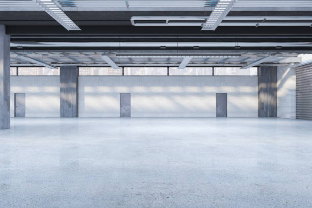 istock Modern spacious concrete warehouse garage interior. Space and design concept. 3D Rendering. 1386709226