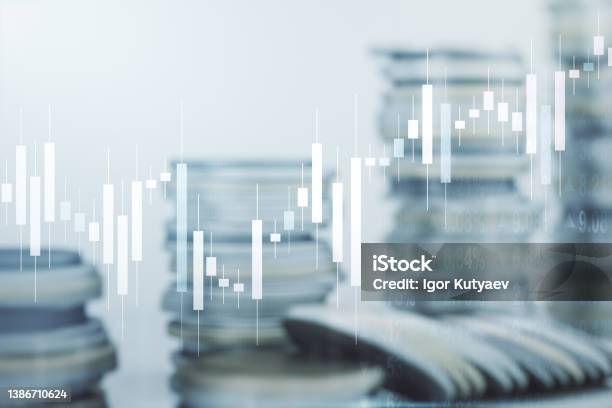 Multi Exposure Of Abstract Virtual Financial Graph Hologram On Stacks Of Coins Background Forex And Investment Concept Stock Photo - Download Image Now