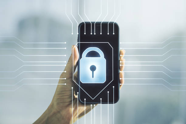 istock Creative lock illustration with microcircuit and hand with mobile phone on background, cyber security concept. Multiexposure 1386710657