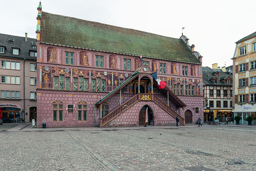 side view of the old town hall in Mulhouse city center. 01/08/2022 - Place de la Réunion, 68100 Mulhouse, France