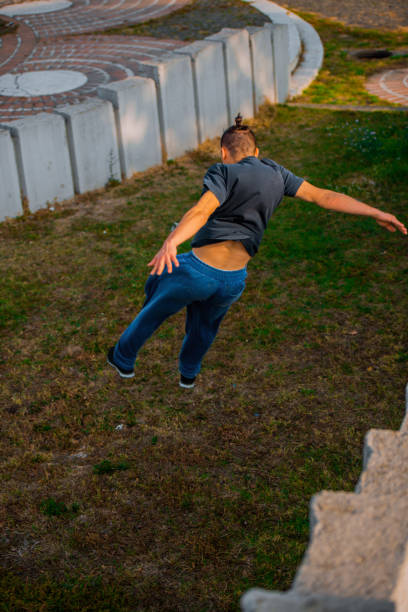 istock Stuntman doing tricks while jump in the air 1386715404