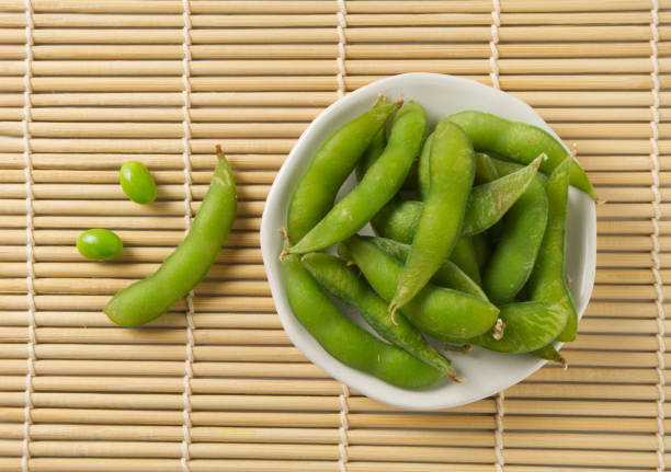 Japanese boiled green soybeans  edamame stock photo