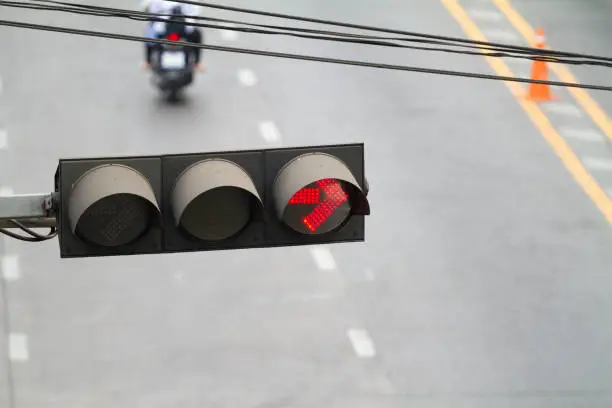 Red arrow of stoplight to the right in Bangkok