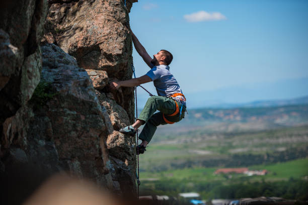 istock The climber trains on a natural relief 1386718388
