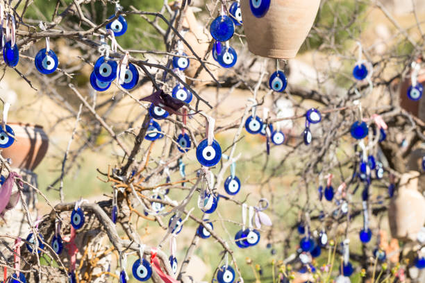 istock Turkish amulets from the evil eye on the branches of a tree. 1386719344