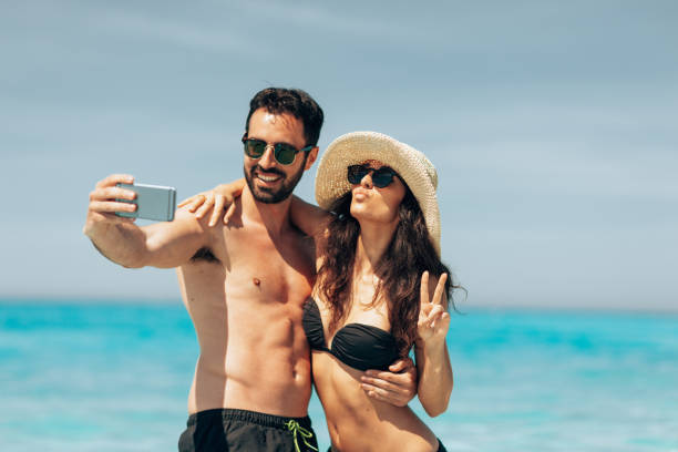 istock embracing at the seaside in summer 1386720685