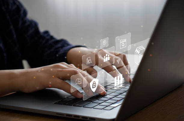 istock a business man who uses a computer to manage documents document management concept online document database digital file storage icon software record keeping technology files document 1386722917