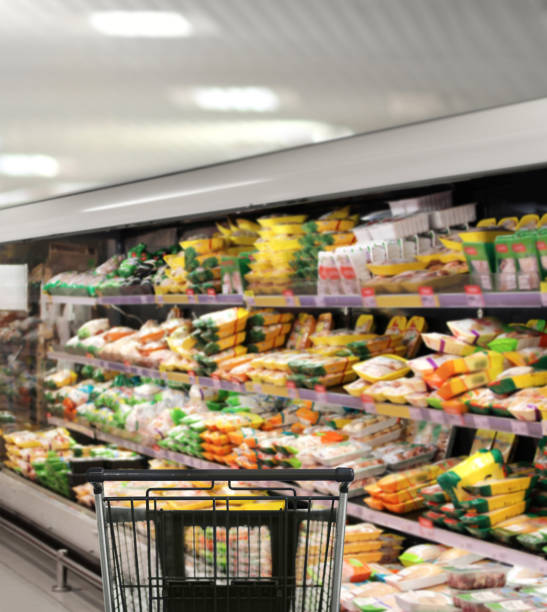 istock empty grocery cart in an empty supermarket 1386725410