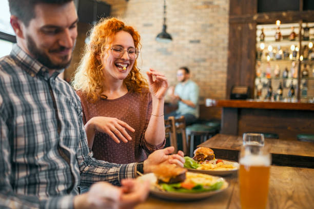 istock Young couple having meal 1386728622