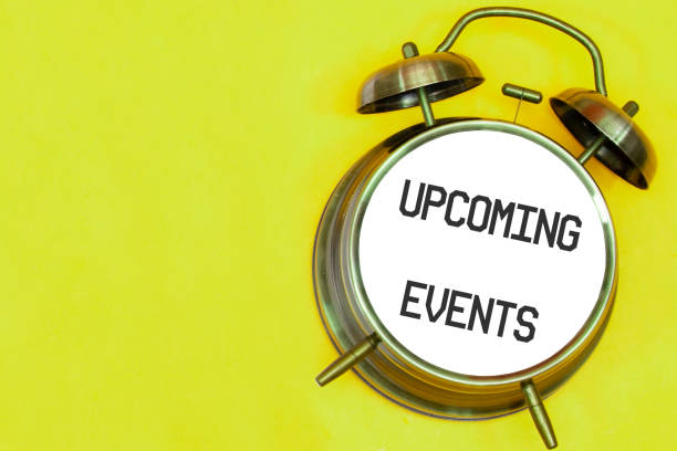 istock UPCOMING EVENTS on old alarm colck screen 1386730913