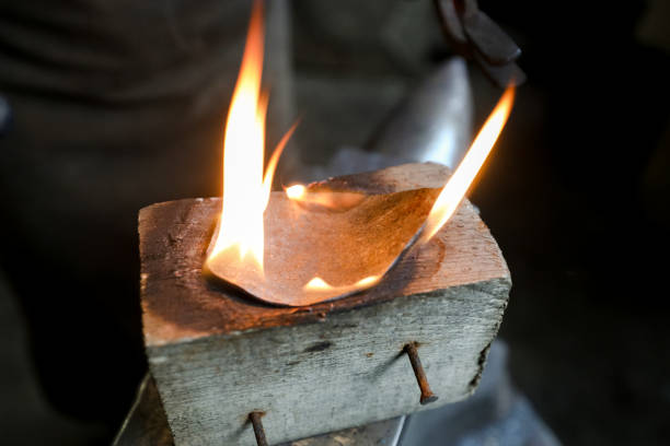 MINSK, BELARUS - 18 FEBRUARY, 2022: blacksmith working in the forge