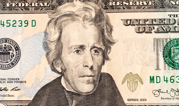 istock Twenty dollars note. President Jackson portrait closeup. US money concept 1386734584