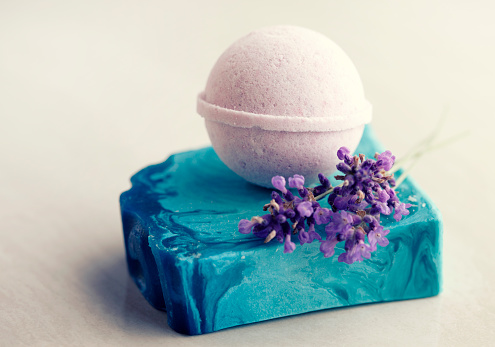 Handmade purple lavender soap and bath bomb with lavender flower.
