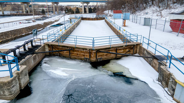 istock Old canal in winter with snow and ice around it 1386737560