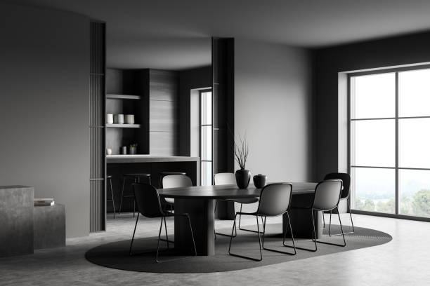 istock Dark kitchen interior with chairs and table, cooking room and window 1386737588