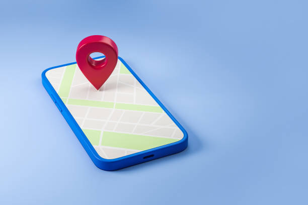 istock Phone display with red map pin, city road. Mockup 1386738777
