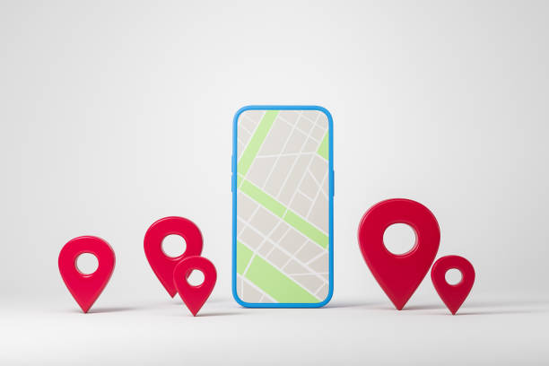 istock Mobile phone screen with city road and red map pins 1386739125