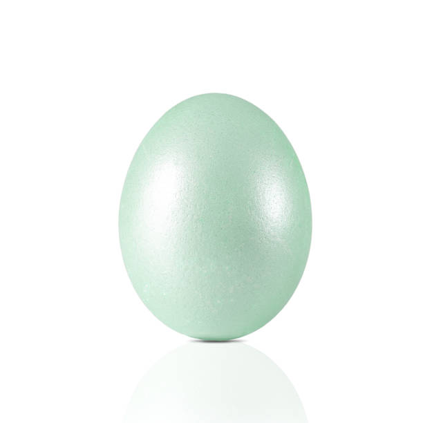istock Light green mother-of-pearl Easter egg 1386741316