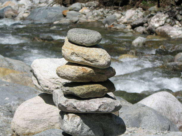 Close-Up of Flat Rocks Stacked by a Stream in a Natural Setting