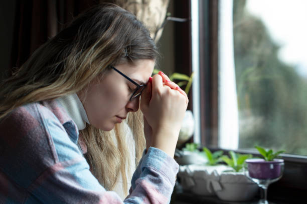 istock Young girl feeling alone and solitude at home 1386743881