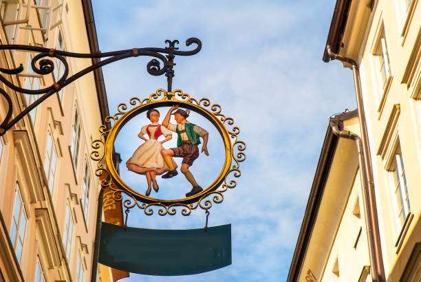 Traditional sign on the  Getriedegasse  in the city of Salzburg in Austria The Getriedegasse is the main shopping street of Salzburg in Austria. In a house No. 9 on this street Mozart was born wolfgang amadeus mozart photos stock pictures, royalty-free photos & images