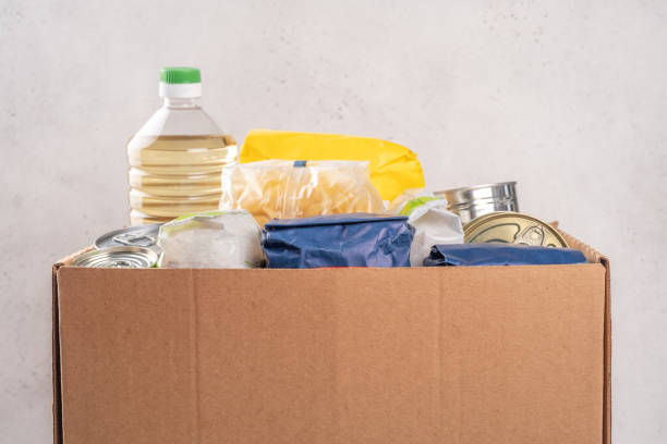 istock Donation box with food. Humanitarian aid. 1386753753