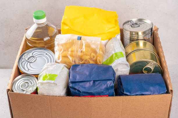 istock Donation box with food. Humanitarian aid. 1386753762
