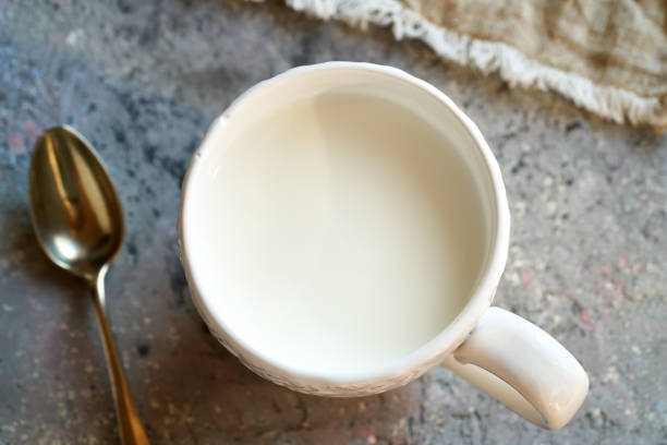 istock Probiotic kefir in a white cup, top view 1386757203