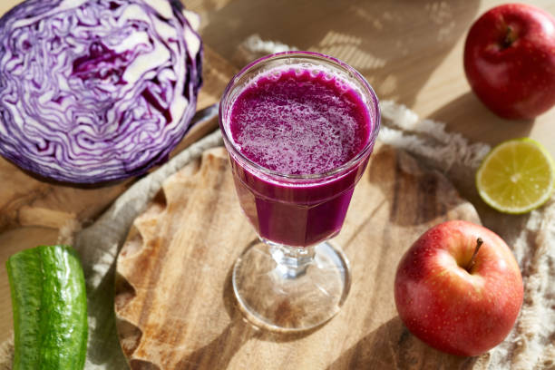 istock Purple cabbage juice with red cabbage, apples and cucumber 1386757274