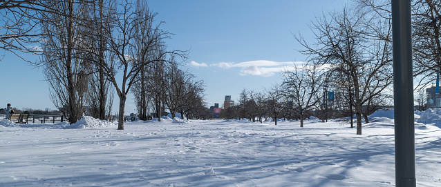 Point of view in Old port, Montreal, Quebec during a clear and sunny day during winter with a lot of snow