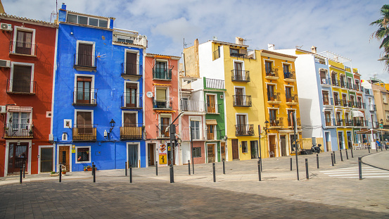 Typical houses with brightly colored facades of Villajoyosa in the old town