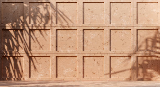 istock Premium abstract concrete texture beige wall background with palm leaves shadow 1386763878