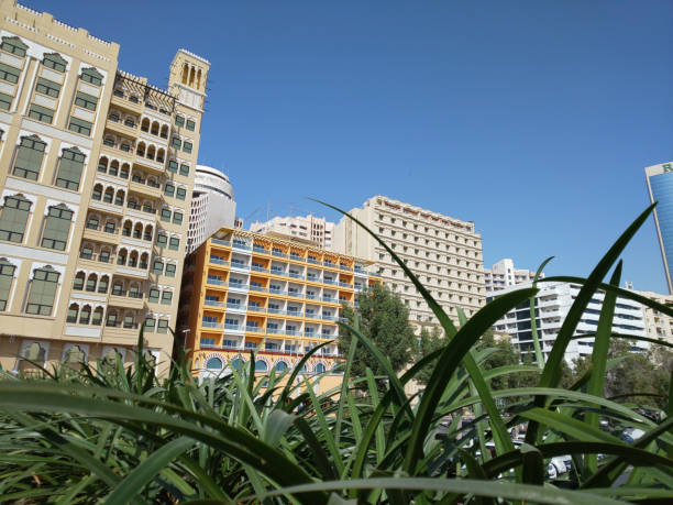 istock low angle view of buildings against clear blue sky 1386767310