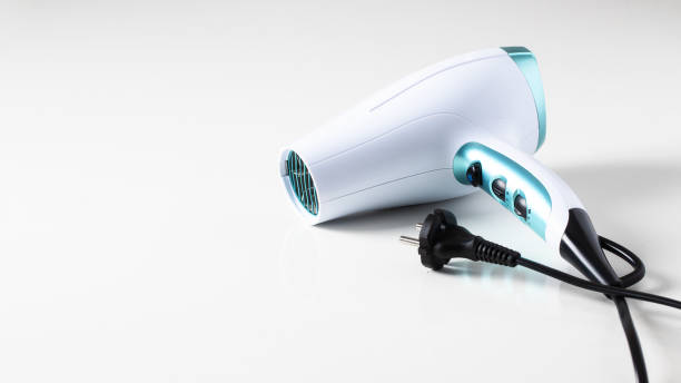 istock Ceramic ionic hairdryer on white background.  Modern device for hairstyling large background for banner.Copy space 1386776747
