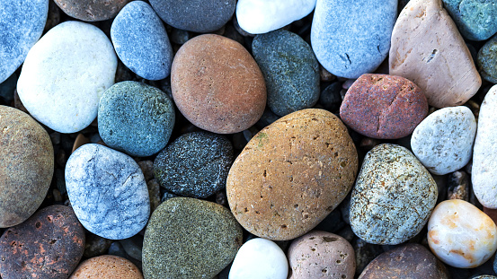Close-up on white pebbles. High angle view.