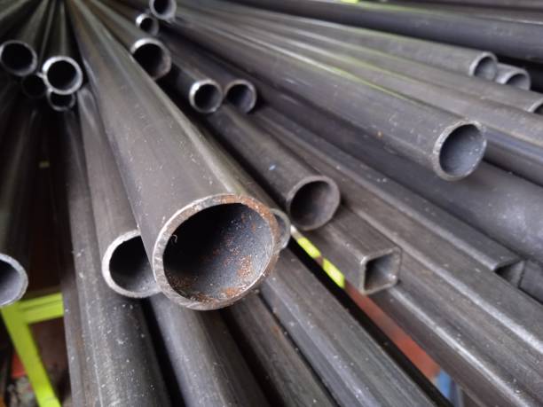 istock A pile of black long iron pipes placed on a shelf 1386788021