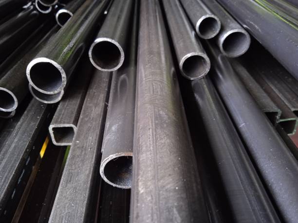 istock A pile of black long iron pipes placed on a shelf 1386788201